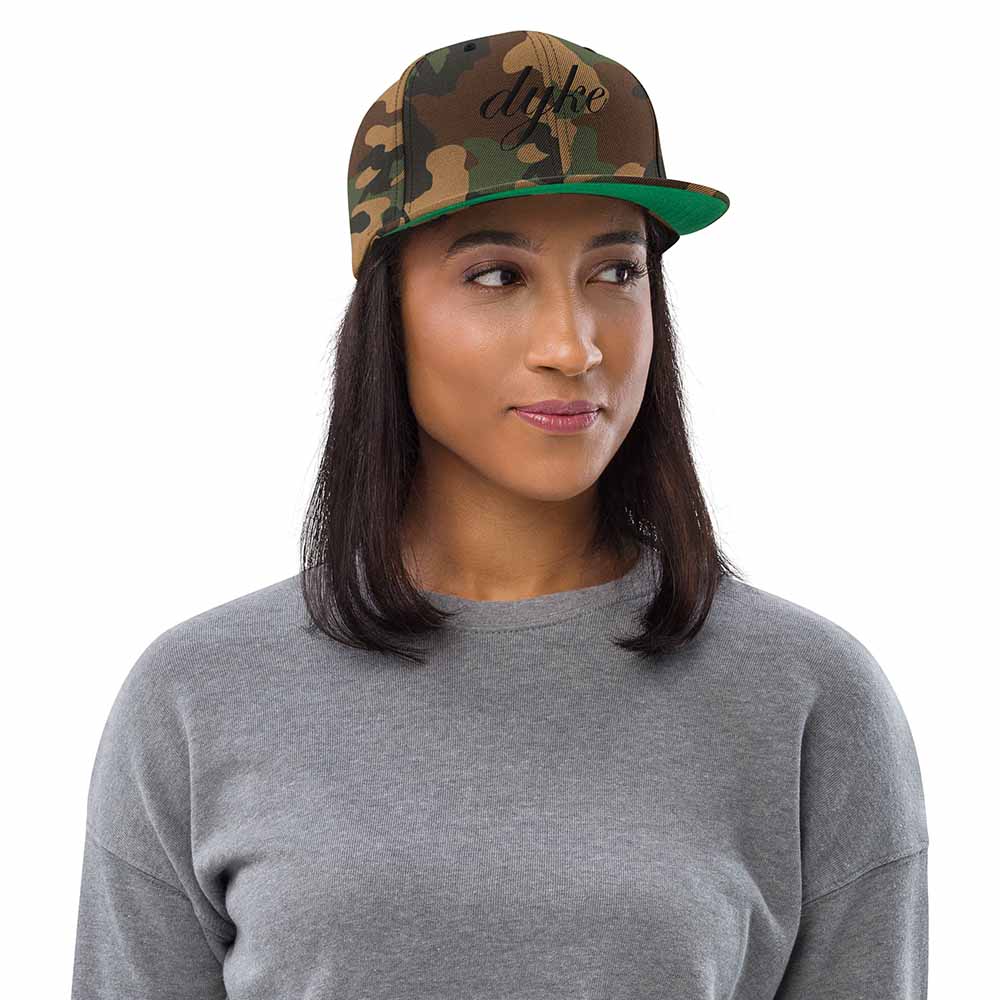 Dyke Script 6 Panel Flatbill Snapback Hat camo on woman