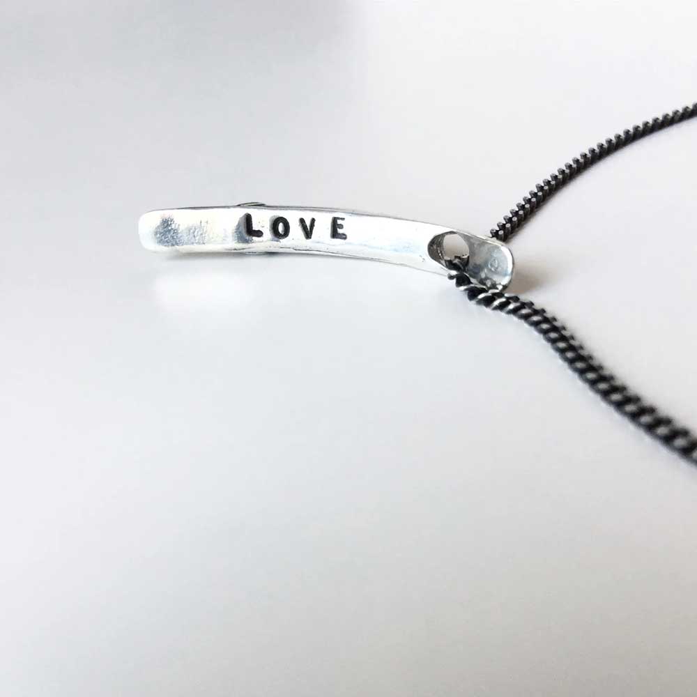 Sliver of a Crescent Moon "Love" Necklace in silver