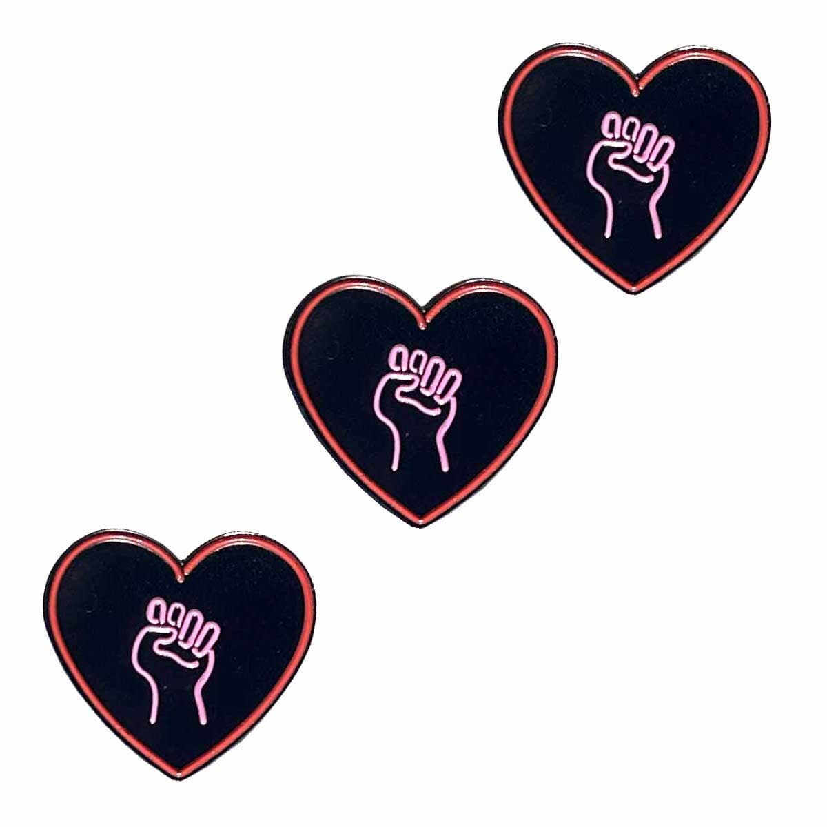 3 love as activism solidarity fist heart pins