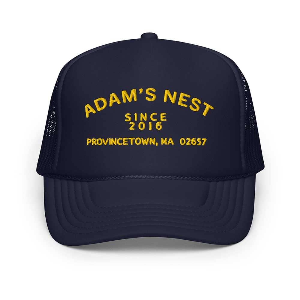 Navy blue cap with yellow text 'Adam's Nest' on a white background