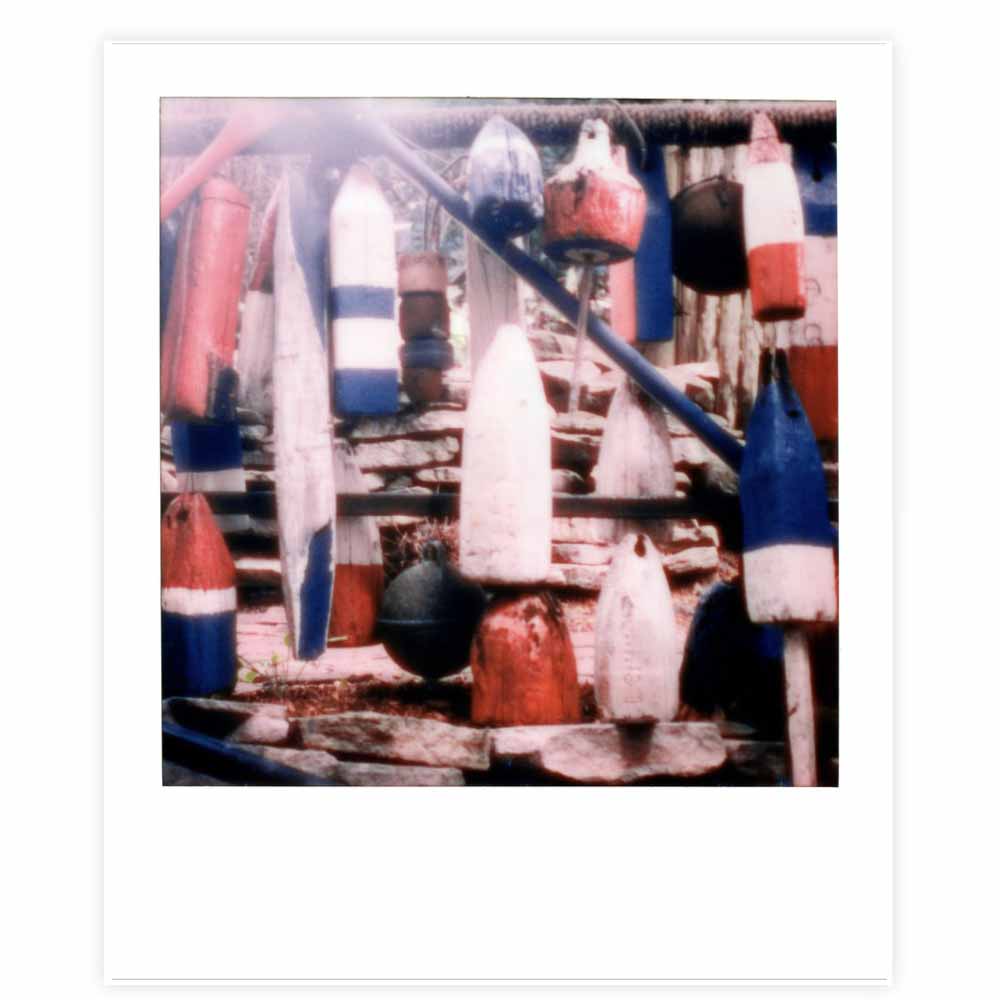 buoys in provincetown red white blue