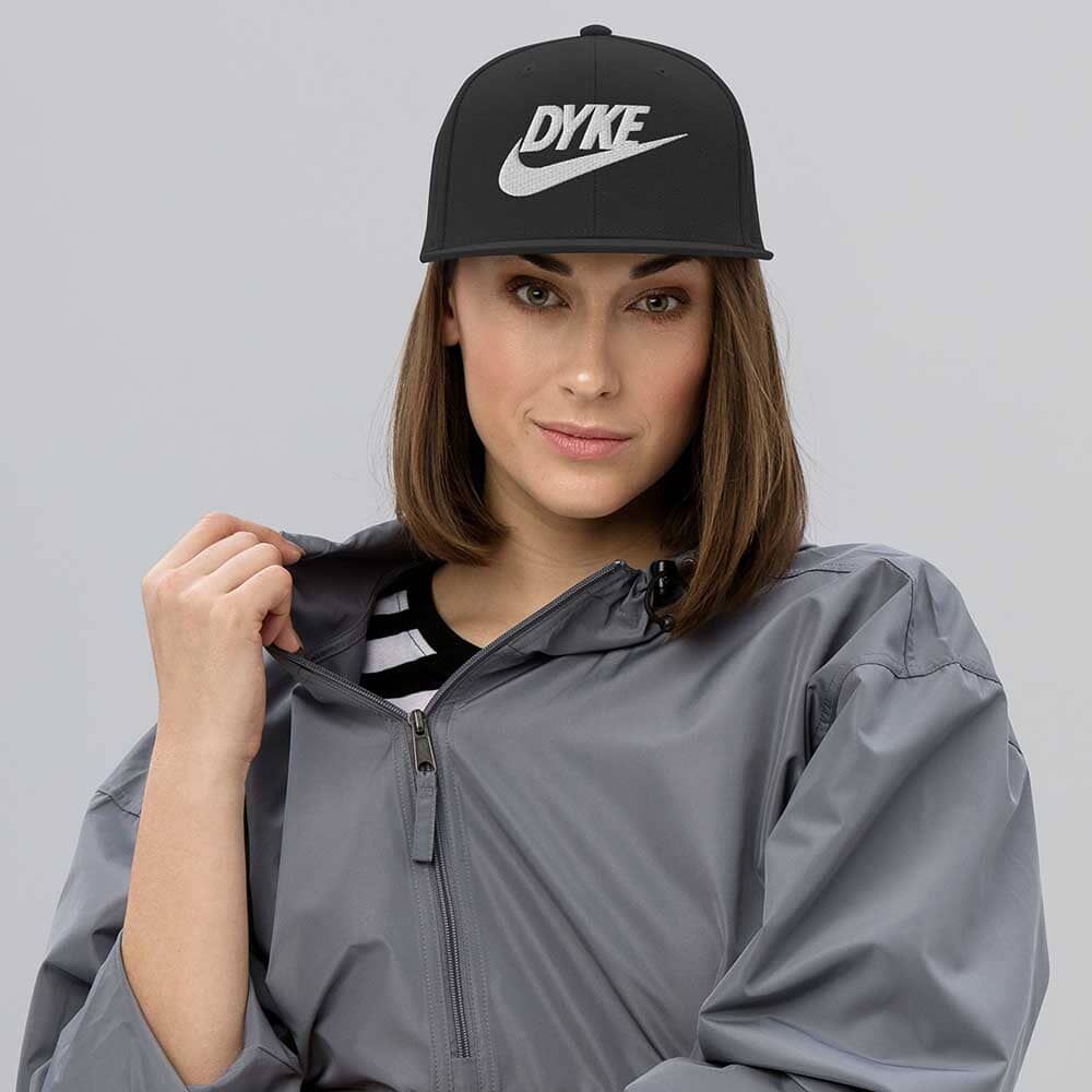 Dyke Sport 6 Panel Flatbill Snapback Hat on woman