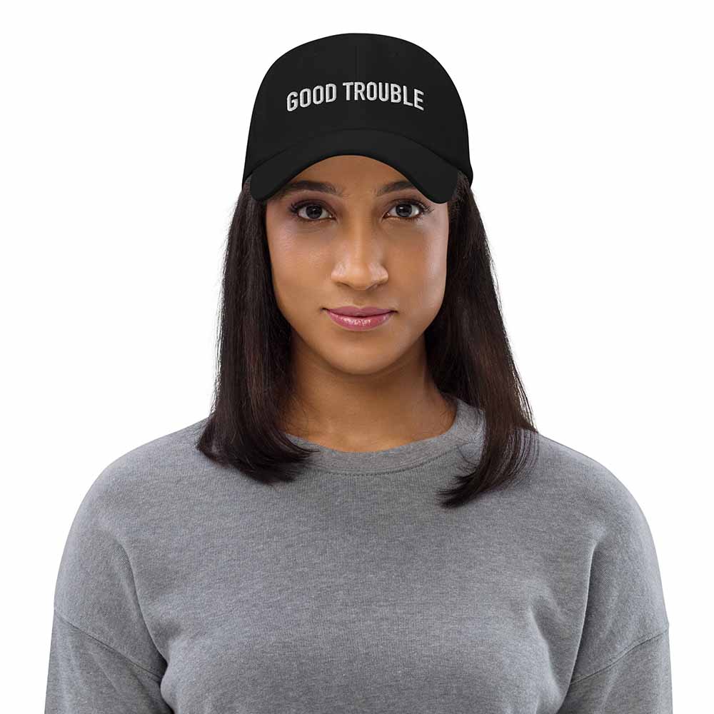 GOOD TROUBLE Trucker Mesh Snapback Hat black on woman
