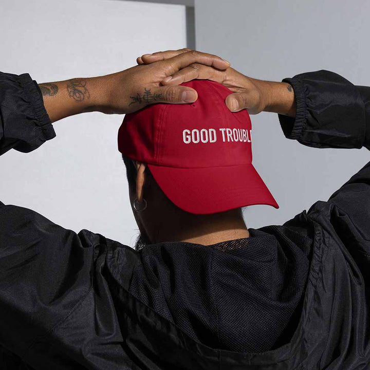 GOOD TROUBLE Trucker Mesh Snapback Hat red on man