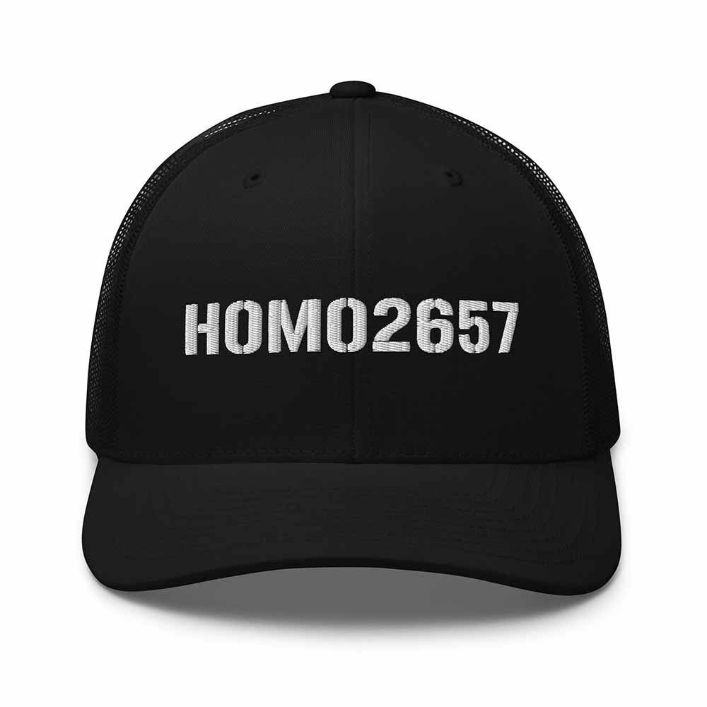 black snapback trucker cap with 'HOMO2657' text on a white 