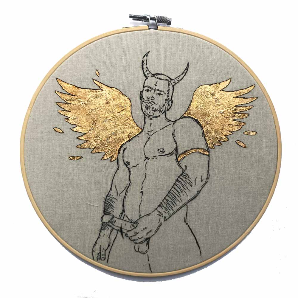 Gold winged devil embroidery