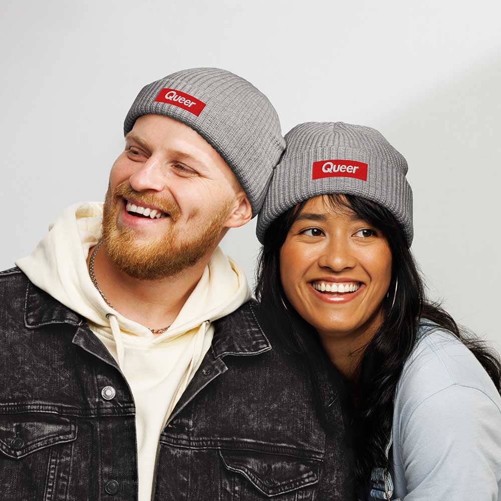 Two people wearing gray &