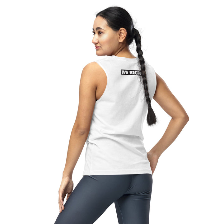 Woman wearing a white sleeveless top with the lesbian avengers and gray leggings on a white background