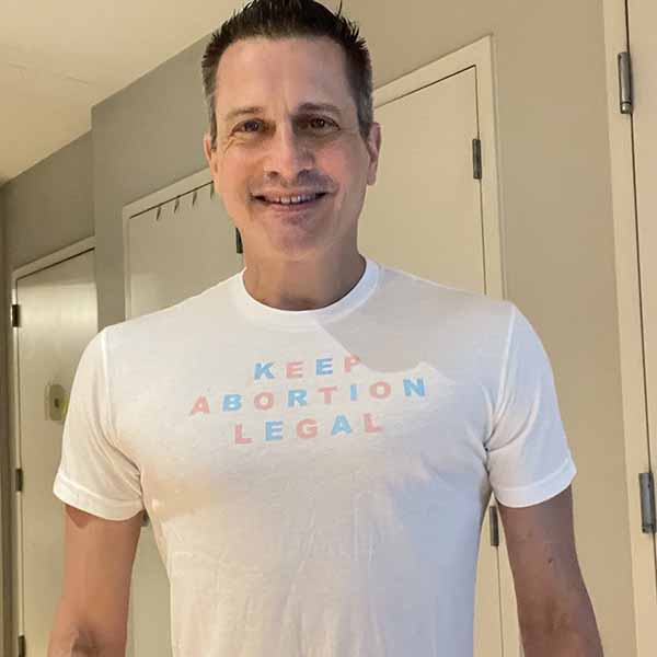 damon jacobs wearing keep abortion legal graphic t-shirt