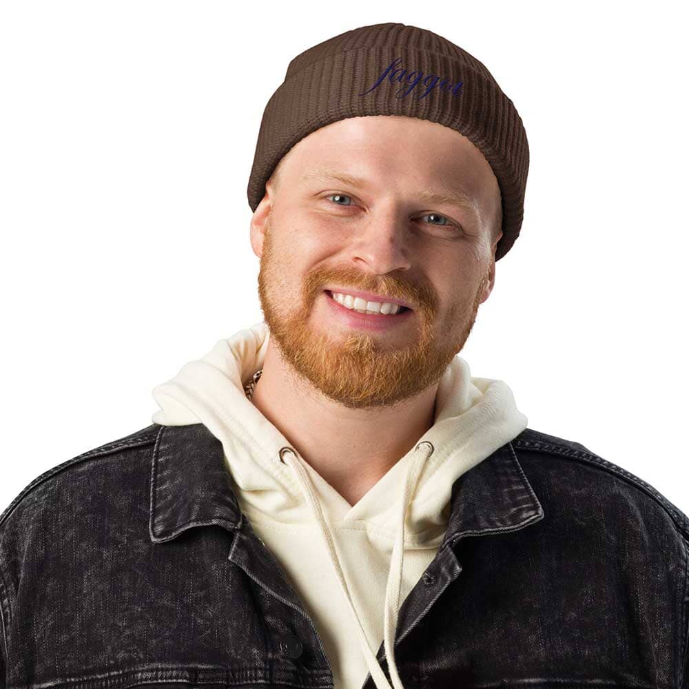 Man wearing a brown beanie with &