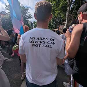 Person wearing a white t-shirt with &