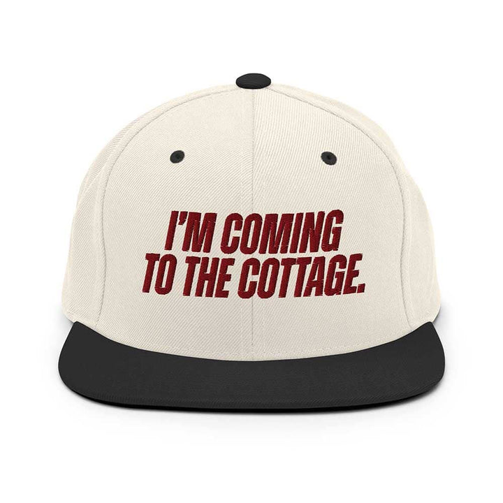 Beige cap with red text &