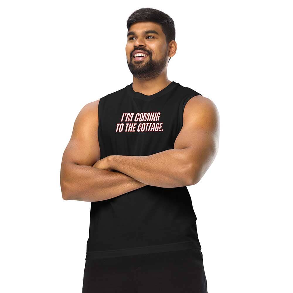 Man wearing a black sleeveless shirt with text on a white background