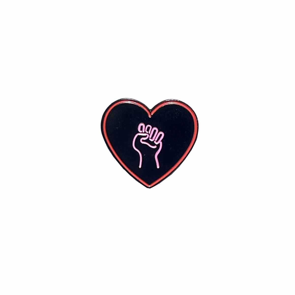 love as activism solidarity fist heart pin
