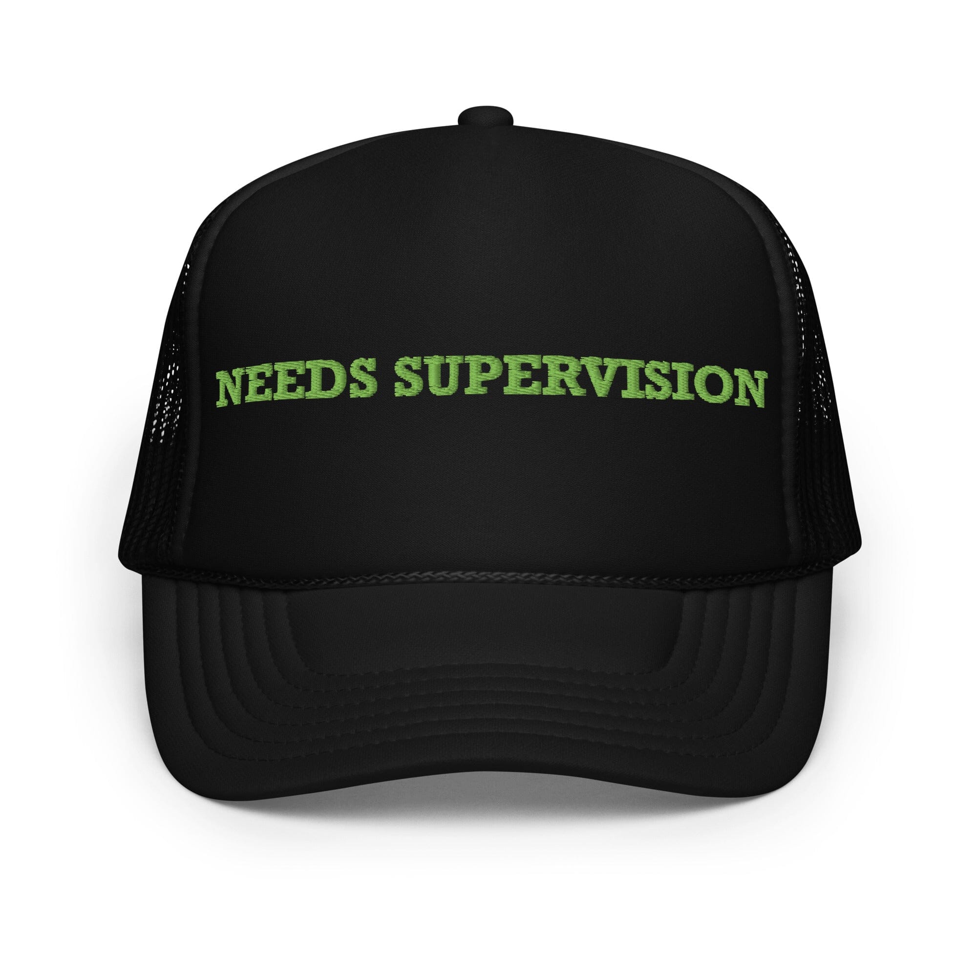 Black cap with 'NEEDS SUPERVISION' text in green on a white background