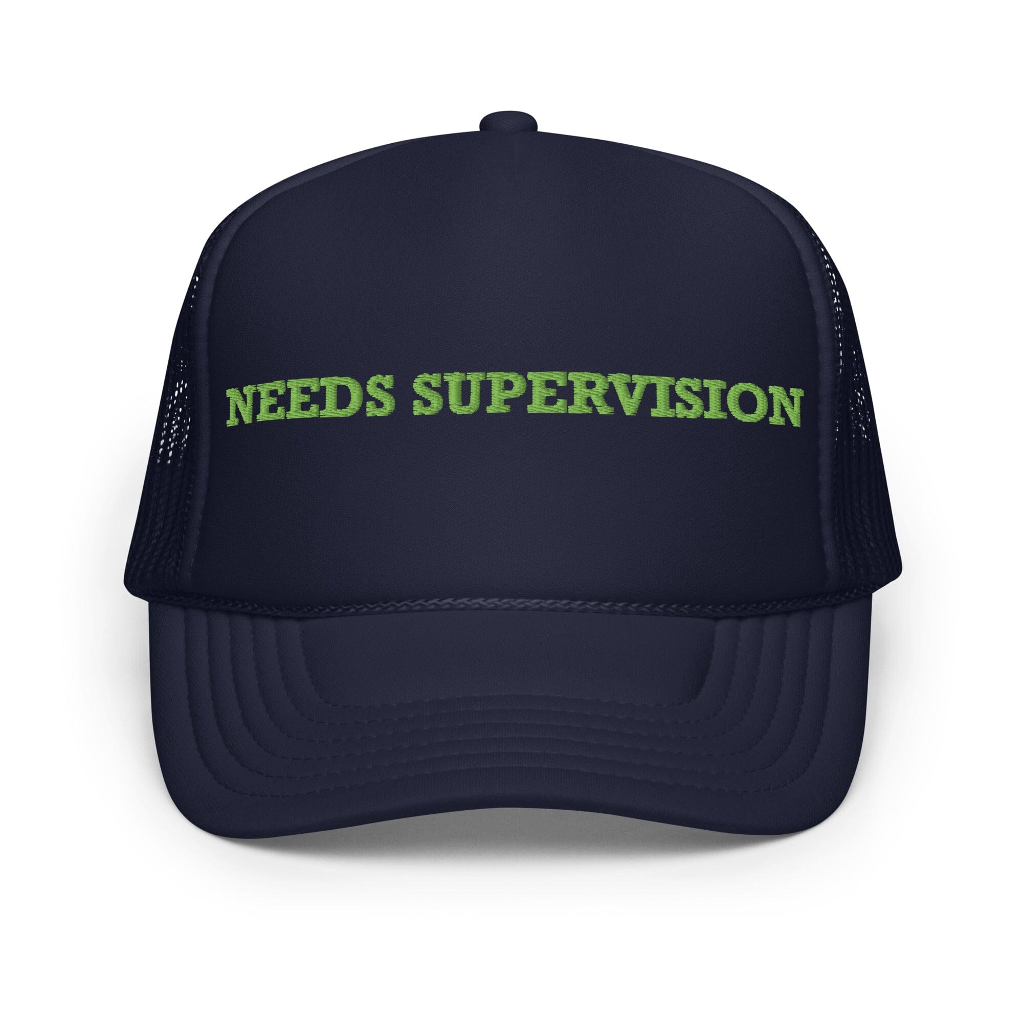Navy blue cap with 'NEEDS SUPERVISION' text in green on a white background