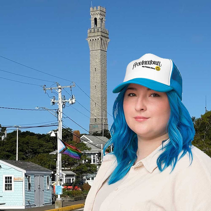 Person with blue hair wearing a &