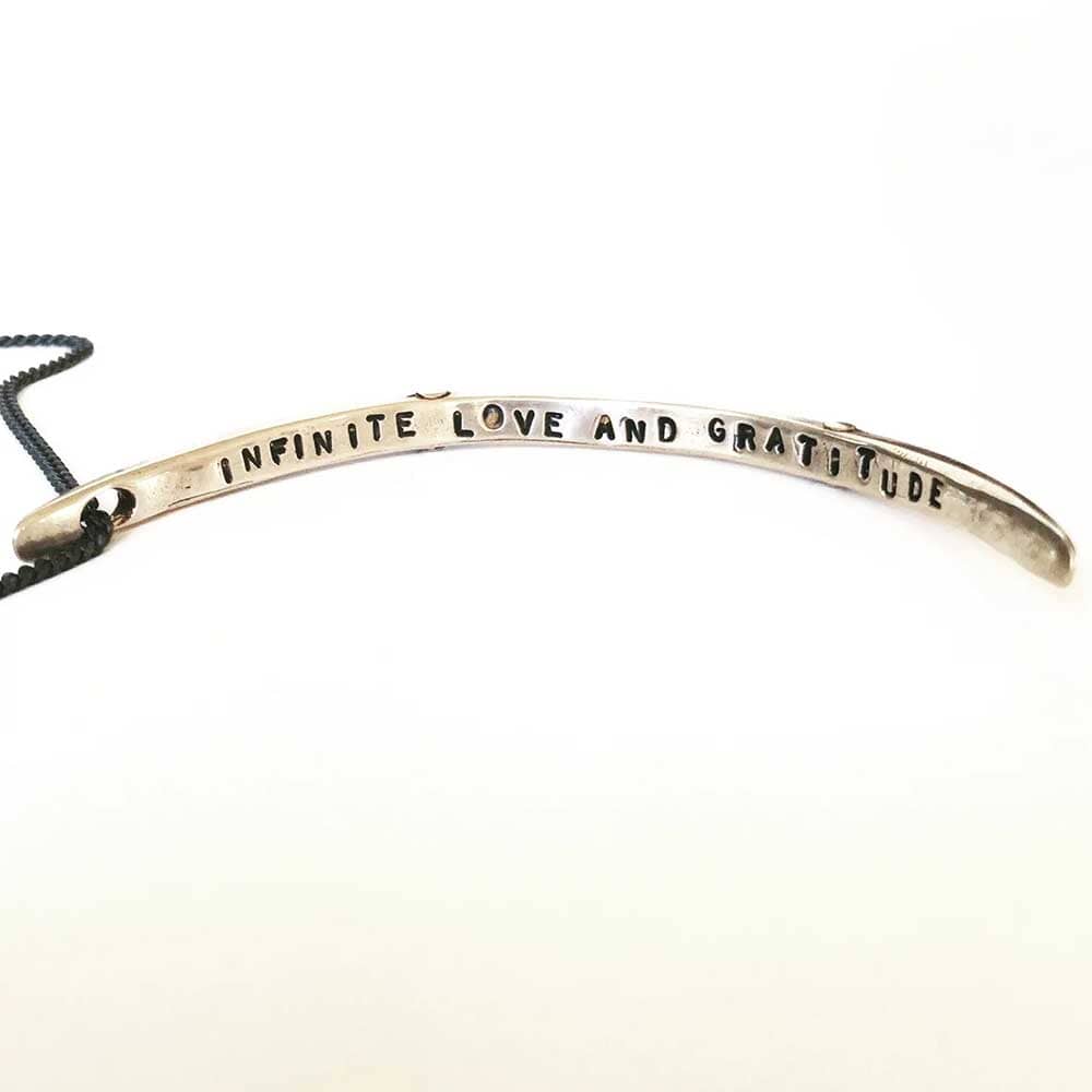 infinite love and gratitude necklace detail