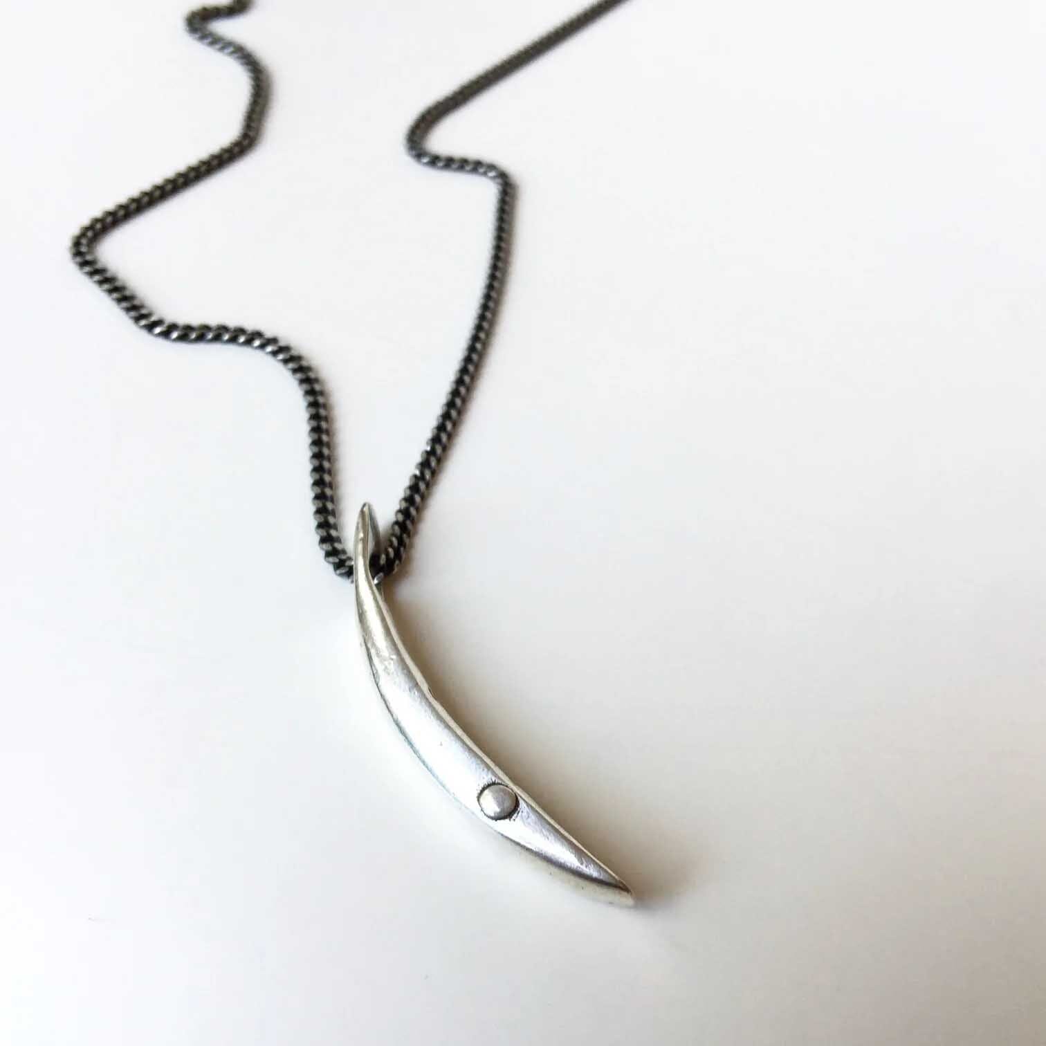 Sliver of a Crescent Moon "Love" Necklace in silver rivet detalil