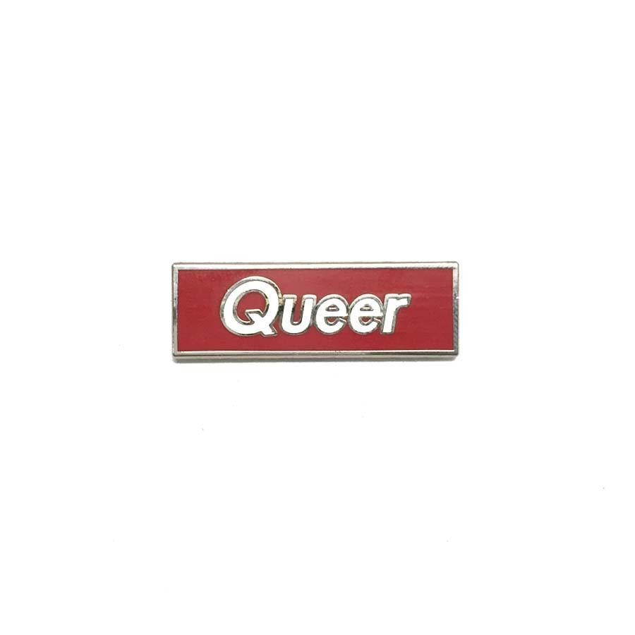 queer red rectangle white type enamel pin